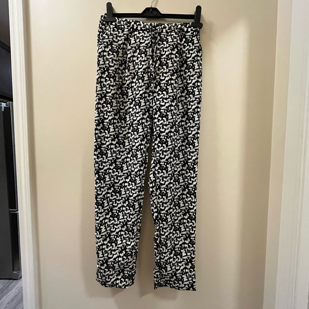 Chic flowy zebra print pants.
